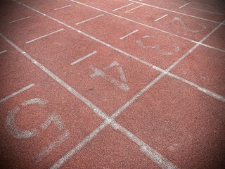 Fototapeta premium The starting point of the sports field track. Concept of competition, victory, winner, loser.