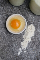 Milk, egg yolk and flour. Composition with ingredients for pastries. 
