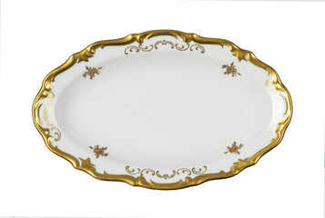 Vintage plate of unusual shape with gold rim isolated. Bowl top view.