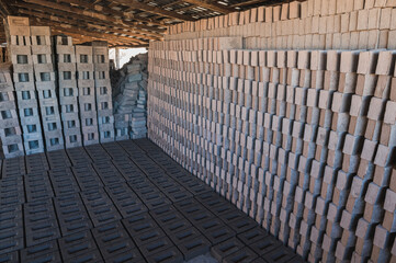 Fresh building bricks drying in the open air for subsequent firing in kilns.