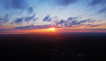 Top view of beautiful sunset with cloudy sky