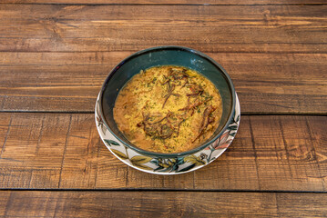 Kashke Bademjan is a classic eggplant caviar cooked with onion, garlic and Kashke iran (Greek yogurt) which makes it super tasty