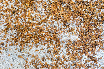 Small pebbles texture and background, pebbles on the ground decorated as walkway in the garden
