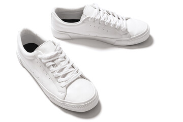 Pair of white leather trainers on white background