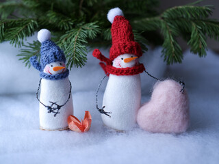 snowman with heart on white background
