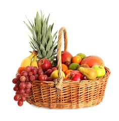 Wicker basket with different fresh fruits isolated on white