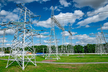 High voltage electrical network against the blue sky