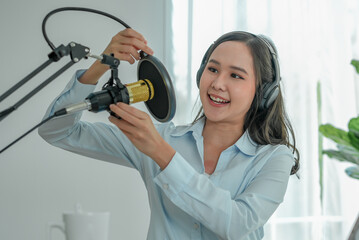 content creator occupation concept. Woman record audio in-home office by condenser microphone