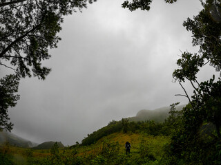 View of Calebasse mountain (Mount Calebasse) and Nouvelle Decouverte village during a rainy and cloudy day in Mauritius