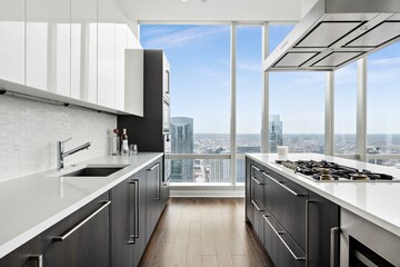 Luxury Kitchen in Penthouse with City Views Two Toned Cabinets Wood Floors