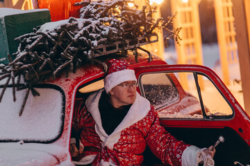 portrait of a person in a hood, santa claus at work