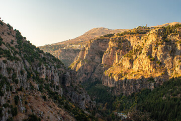 Majestic sunset in the mountains landscape. Wadi Kadicha Bchareh, Lebanon.