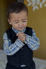 portrait of elegant little boy gesturing
