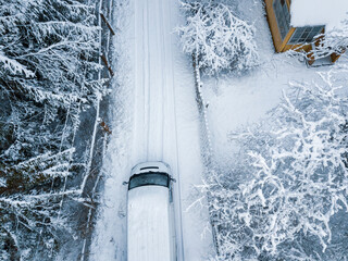 van driving snowy road