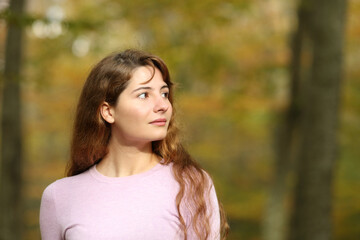 Woman looking at side walking in a park