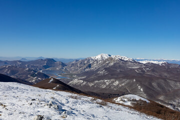 panorama of Matese lake, Monte Miletto and Monte Gallinola with snow. Matese National Park,...