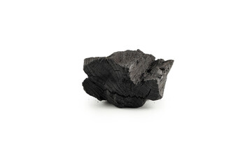 Black oak coal isolated on white background.