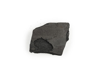 Black oak coal isolated on white background.