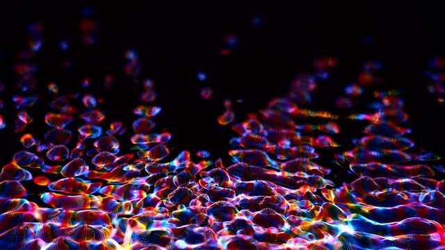 Awesome bg with magic particles float in liquid, light rays like laser show, light effects and bokeh, DOF. Glowing multi-colored particles circle underwater forming cloud. Luma matte as alpha channel.