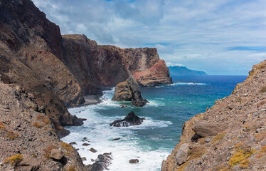 The north coast of Madeira Island as seen from Ponta de São Lourenço. You can see the sea and impressive volcanic cliffs.