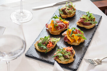 different kinds of canape on table