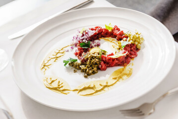 beef tartar with egg and pickles
