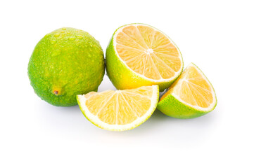Fresh lime with slices and half on white background