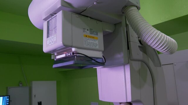 X-Ray Machine for Scanning His Leg for Injury. Scanning for Fractures, Broken Limbs, Cancer or Tumor