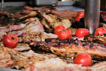 Grilled tomatoes and pork ribs