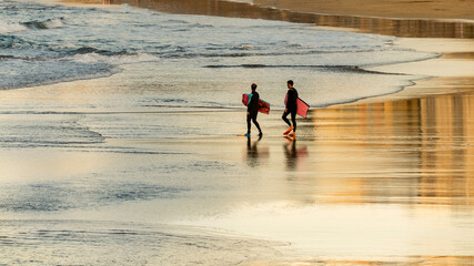 Fototapeta na wymiar Surfing in Las Canteras Beach, in Las Palmas City