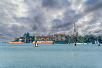 View from Lido to abandoned Poveglia Island, a former Psychiatric Hospital