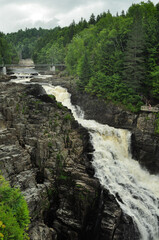 Waterfall in the forest crashing down between the rocks