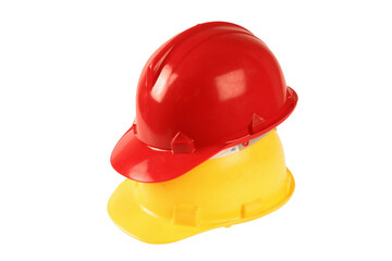 Fototapeta premium Red and white hard hats as used in construction, on a white background.