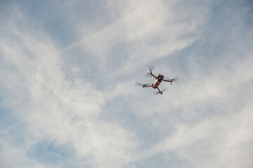 drone flying in blue sky