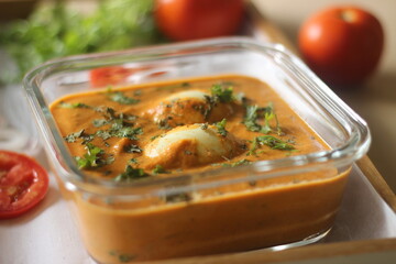 Egg butter masala Served with Indian flatbread smothered with ghee.