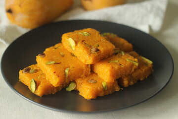 Mango fudge or Mango barfi or Mango kalakand. A mango version of Indian sweet dish Kalakand.