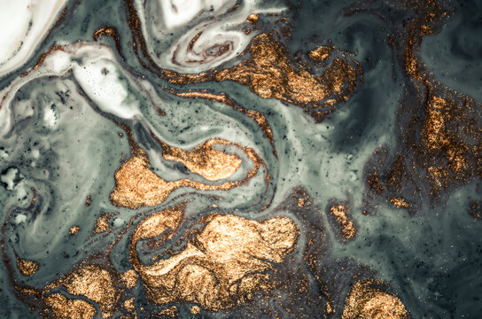 Ripples of agate. Treasury of art. Swirls of marble. Abstract fantasia with golden powder. Extra special and luxurious- ORIENTAL ART. Natural luxury. © CARACOLLA