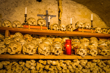 Hallstatt, Austria - July 25, 2020: Decorated Skulls in a Bone House of Hallstatt, Austria on July 23, 2015. Dating back to the 17th century these skulls make an ideal resource for genetic studies.
