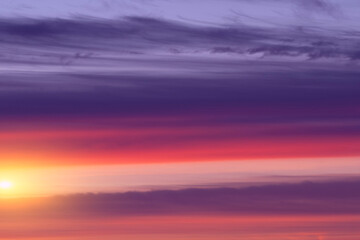 Cold dawn of the sun in the clouds in the sky for wallpaper.