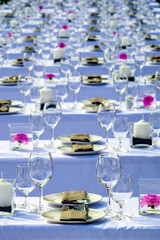 table with silverware and glasses at a restaurant