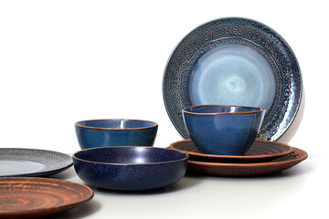 set of plates. different beautiful, ceramic, blue and brown plates.