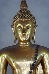Golden Buddha statue at Wat Pho temple, Bangkok Thailand
