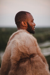 portrait of african american man in furs