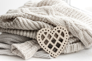 Cozy background for Valentine's Day with a decorative heart.