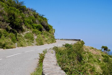 Fototapeta na wymiar Scenic road winding through coast of Cap Corse. Corsica, France.