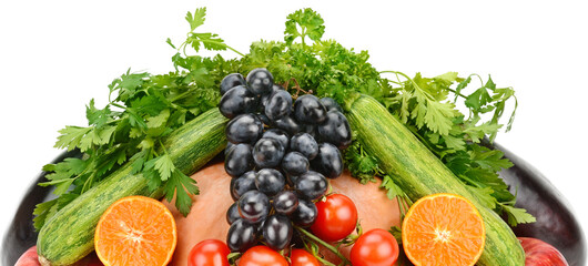 Vegetables and fruits isolated on a white . Wide photo.