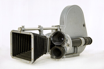USSR vintage movie camera with three lenses on a white background