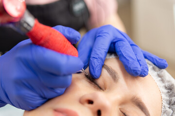 Obraz na płótnie Canvas Permanent make up eyeliner procedure