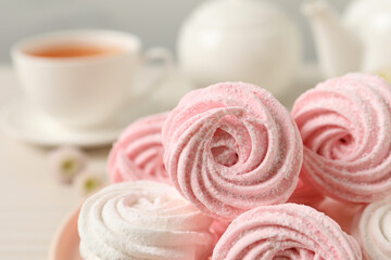 Obraz na płótnie Canvas Delicious pink and white marshmallows on table, closeup