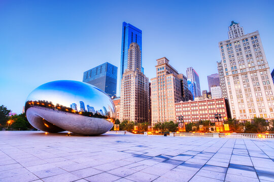 CHICAGO - September 3: Cloud Gate in Millennium Park on September 3, 2015 in Chicago. The Cloud Gate is a major tourist attraction and a gate to traditional Chicago Jazz Fest (September 3 - 6 2015).